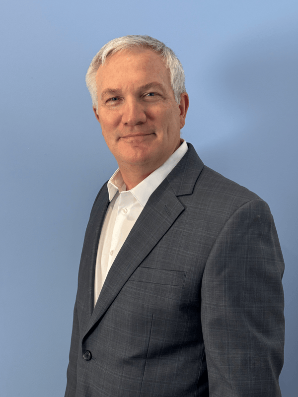 Dr. Erik Mobly in a blue suit