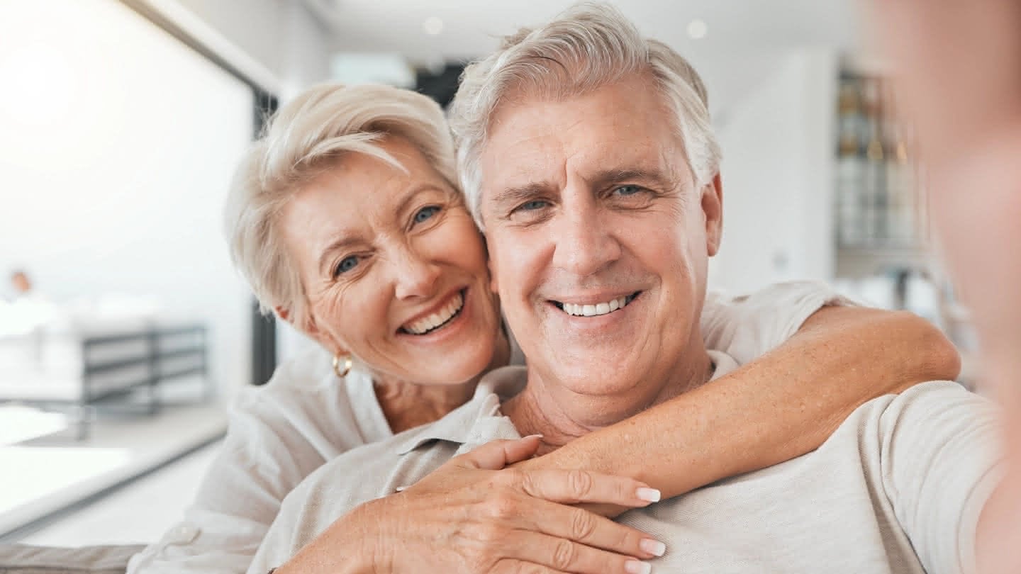 Two people sitting on a couch